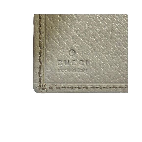 Pre Loved Gucci PCV Leather Trifold Wallet with Ivory Accents - Picture 5 of 8